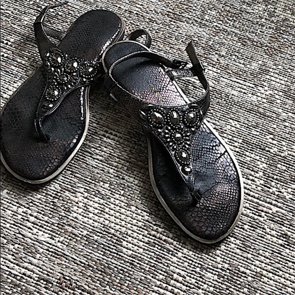 T strap black flat leather sandal with jewel detail